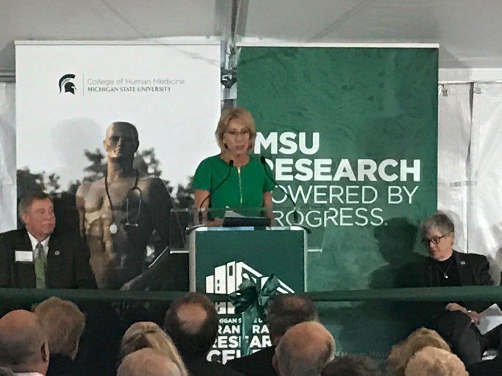 <p>U.S. Secretary of Education Betsy DeVos speaks at the ribbon cutting of the MSU Grand Rapids Research Center on Sept. 20, 2017.</p>