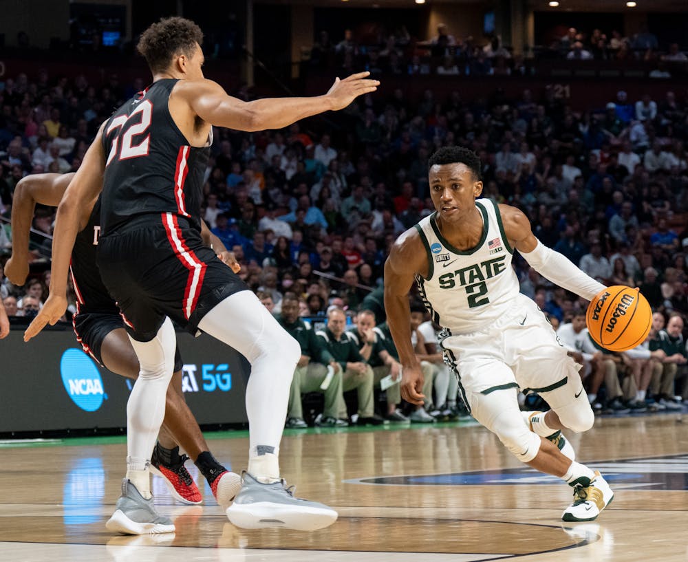 <p>Junior guard Tyson Walker (2) brings the ball up the court during Michigan State&#x27;s win over the Davidson Wildcats on March 18, 2022.</p>