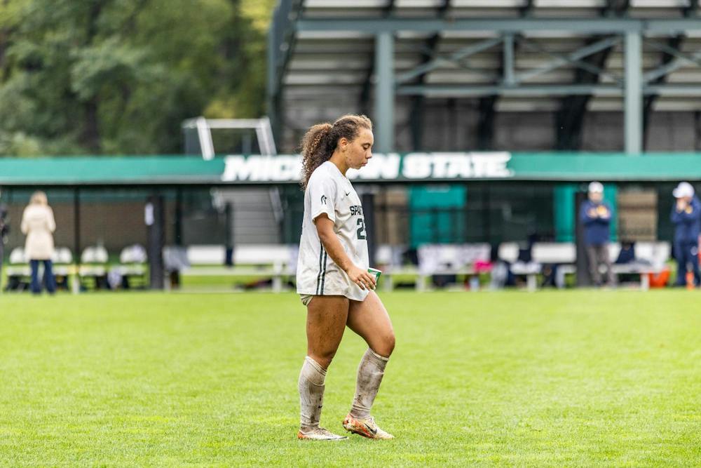 <p>Michigan State senior defender Renee Watson (28) walks across field in disappointment after Michigan's victory over the Spartans in DeMartin Stadium in East Lansing, Mich., on Sept. 20, 2026.</p>