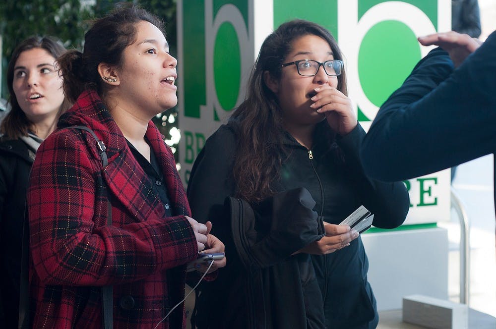 	<p>Japanese junior Karla Davila, left, and advertising junior Jovanska Almanza, right, find out there are no more movie tickets Nov. 19. 2013, at Brody. College ambassadors from the Cross Cultural Marketing Group gave away 392 advance screening tickets to students for &#8220;The Hunger Games: Catching Fire&#8221; to be shown at <span class="caps">NCG</span> Eastwood Cinemas. Margaux Forster/The State News</p>