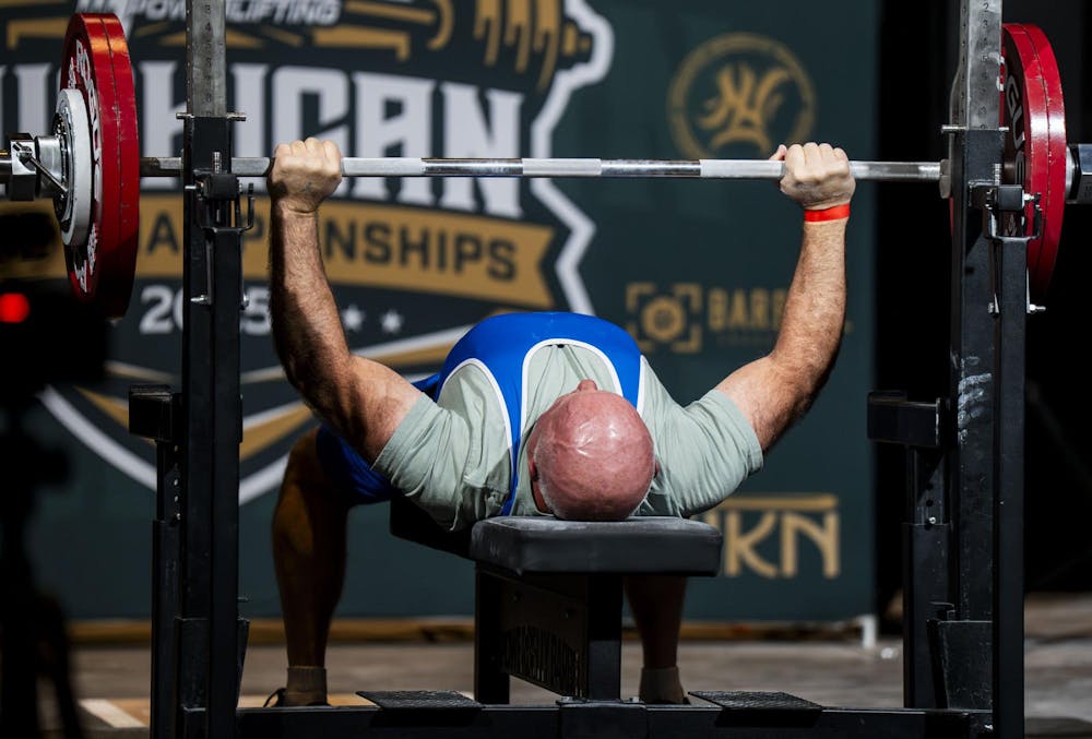 <p>Anthony Jones benches 137.5 kg at the 2025 USA Powerlifting Michigan State Championships in Lansing, Mich., on Nov. 23, 2025.</p>