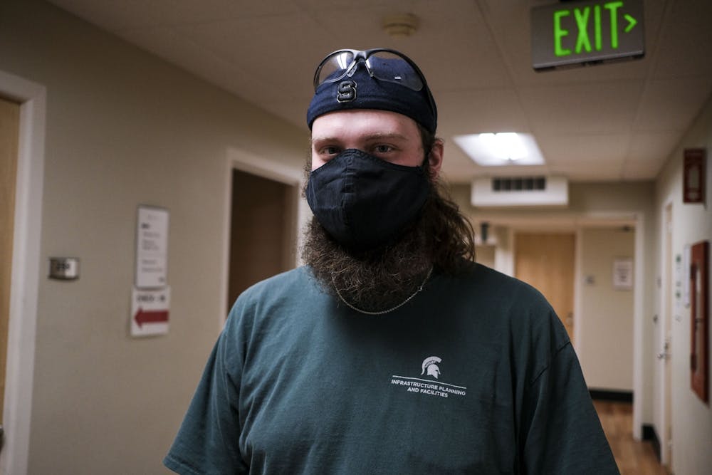 Casey Serr, part of the third shift janitorial staff at Olin Health center as well as an essential worker on February 3, 2021.
