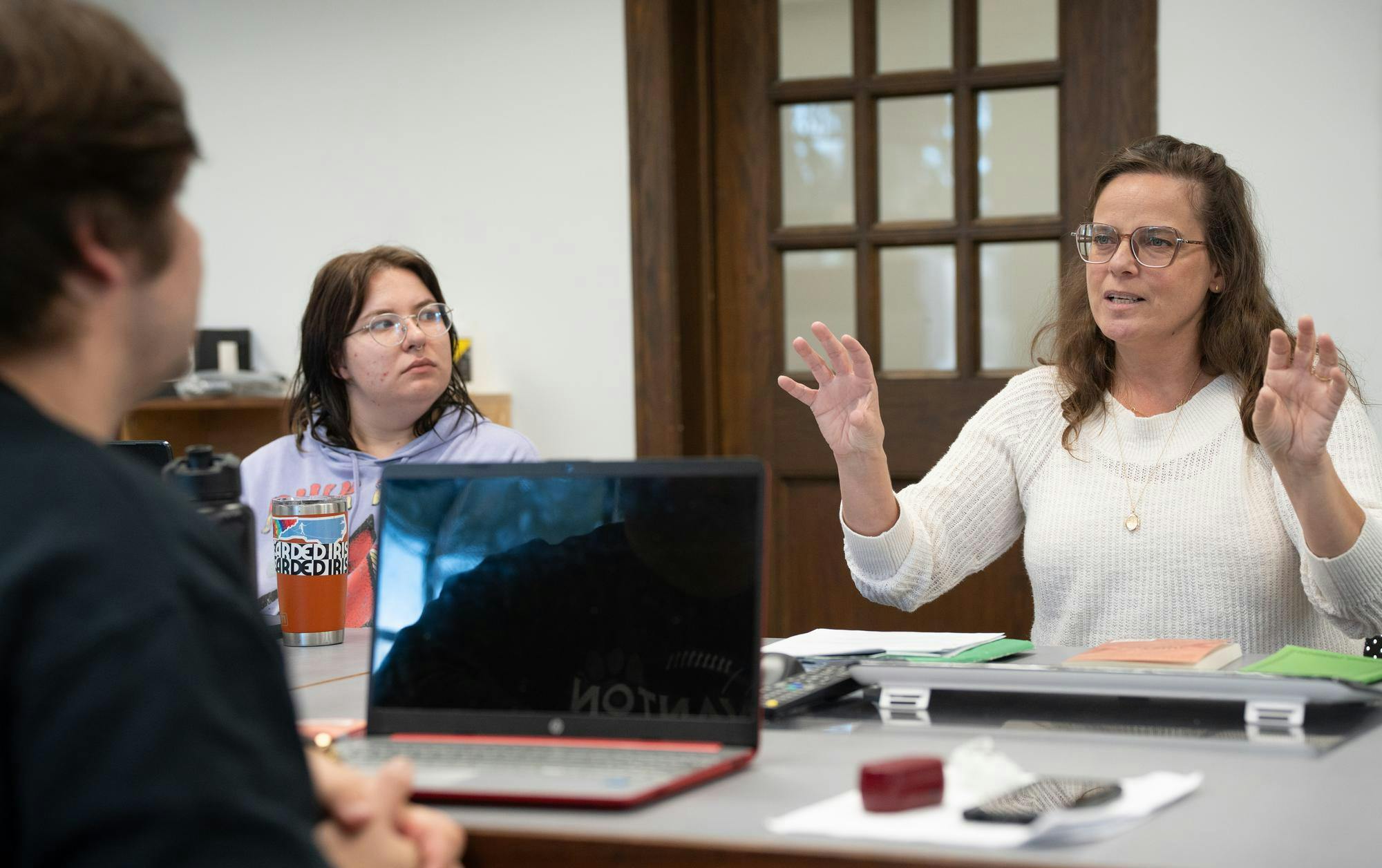 <p>Michigan State associate professor and Head of Theater Studies Ann Folino White answers questions in her graduate studies course alongside scenic design graduate Shea Snow at the MSU Auditorium on Oct. 8, 2024.</p>