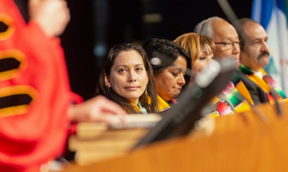 (Name) looks on as the ceremony starts. The Hispanic/Latino Commission of Michigan held its Statewide College Graduation Ceremony at Lansing Community College’s Dart Auditorium on April 5, 2019. 