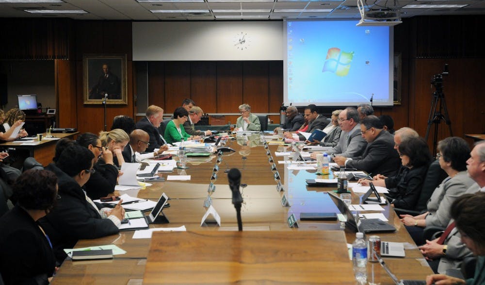 <p>The MSU Board of Trustees discuss issues during their&nbsp;June 17, 2015, meeting at the Hannah Administration Building. Joshua Abraham/The State News</p>