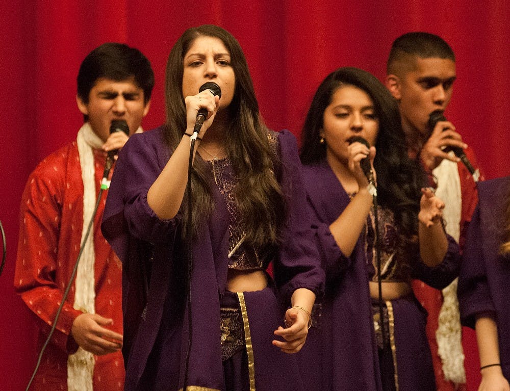 <p>Supply chain management sophomore Esha Joshi the lead Feb 29, 2015, at the Spartan Sur winter concert at The Kellogg Center. The group addressed Indian American stereotypes through skits and song. Kennedy Thatch/The State News. </p>