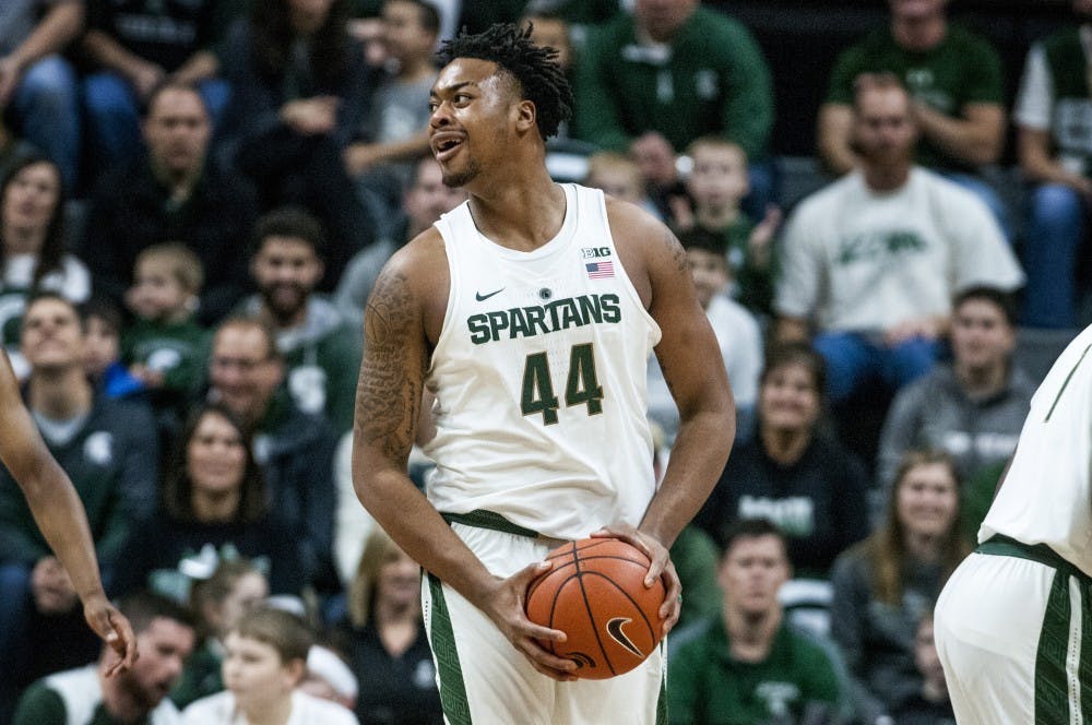 Freshman forward Nick Ward (44) reacts to a play during the first half of the game against Oakland on Dec. 21, 2016 at Breslin Center. 