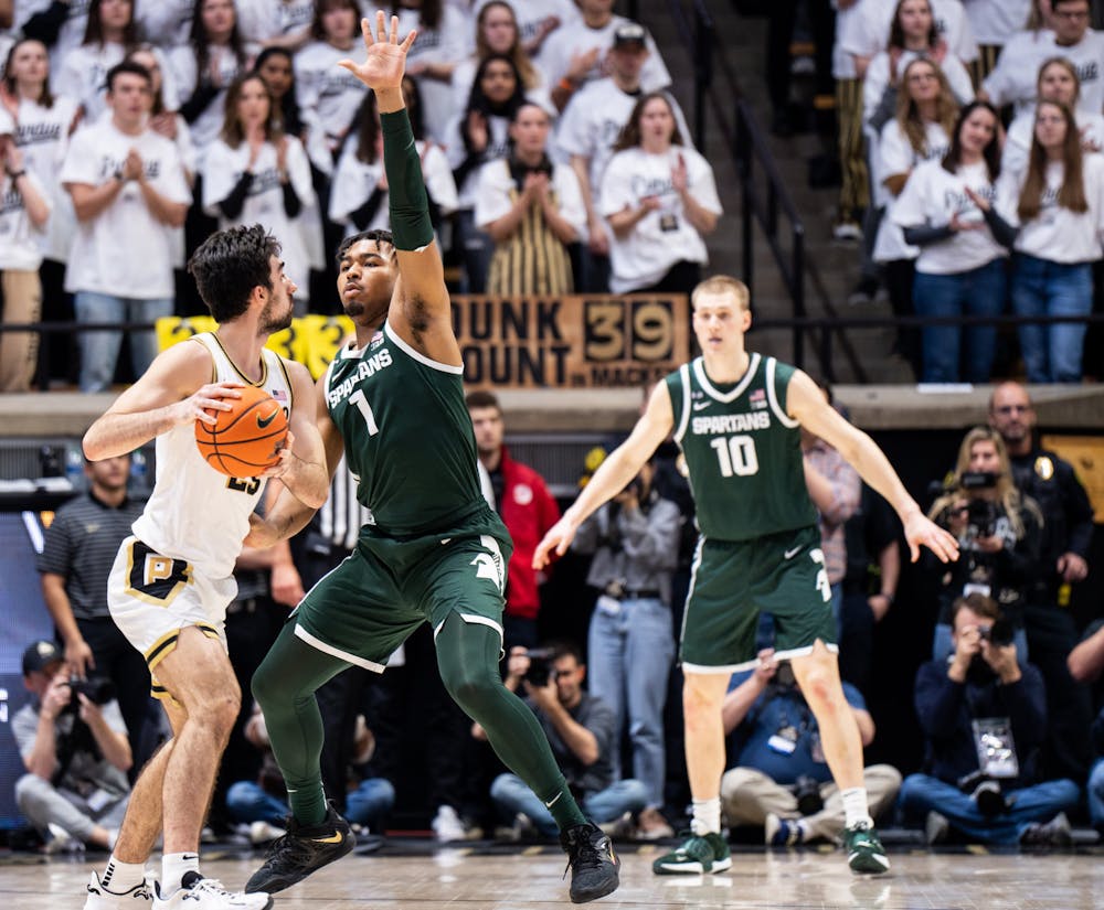 <p>Sophomore guard Pierre Brooks (1) guards Purdue's junior guard Ethan Morton (25) during a game against Purdue at Mackey Arena on Jan. 29, 2023. The Spartans lost to the Boilermakers 77-61.</p>