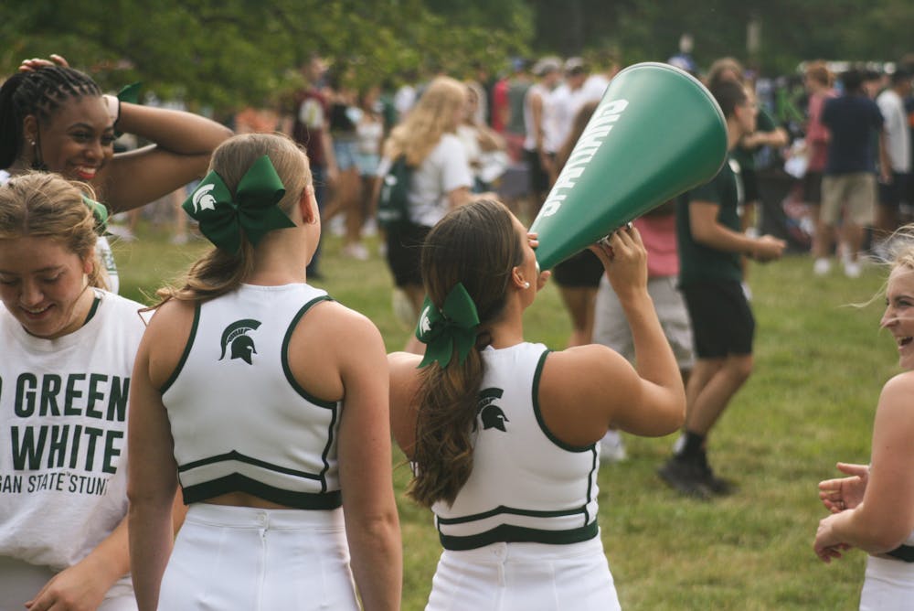 Anthropology Senior Madison Towers fires up the crowd with her fellow cheerleaders at Sparticipation on Aug. 31, 2021.
