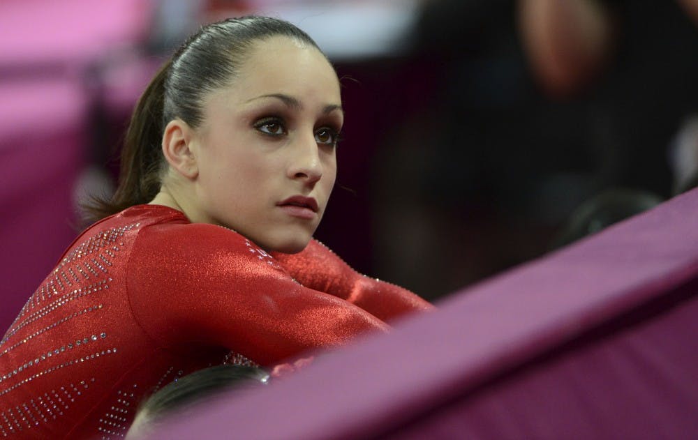 USA's Jordyn Wieber stretches in between routines in the women's gymnastics team final during the Summer Olympic Games in London, England, Tuesday, July 31, 2012. (Vernon Bryant/Dallas Morning News/MCT)