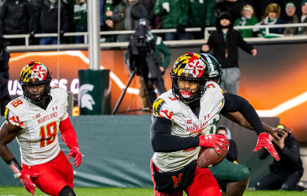 <p>Maryland&#x27;s redshirt sophomore quarterback Taulia Tagovailoa (3) intercepts the ball on Nov. 13, 2021.</p>