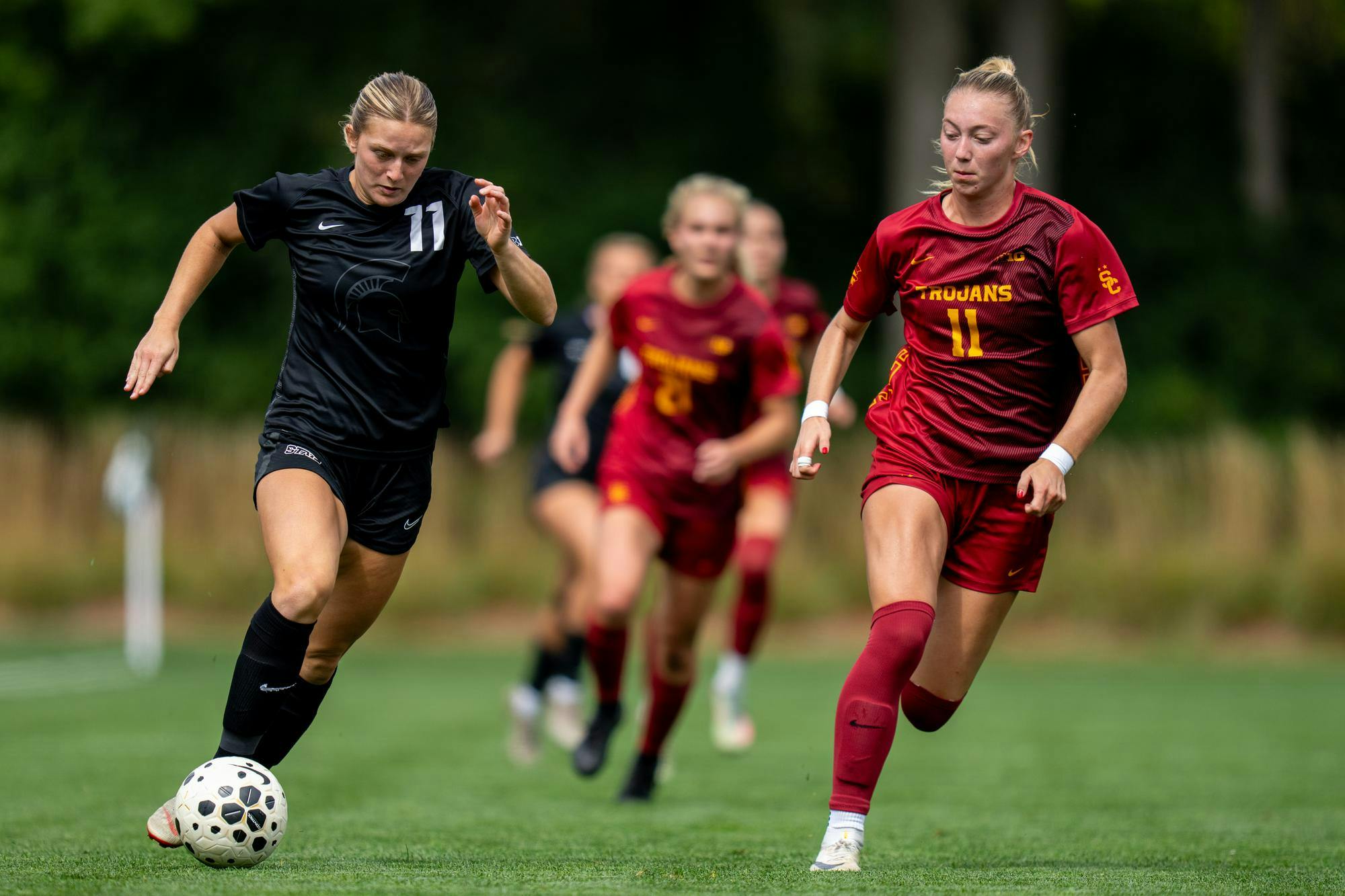 <p>MSU Forward, Adelle Francis (11) and USC defender, Lily Biddulph (11), fight for the ball during the MSU versus USC Women's Soccer game at Michigan State University’s DeMartin Soccer Stadium on Sunday, Sept. 21, 2025.</p>