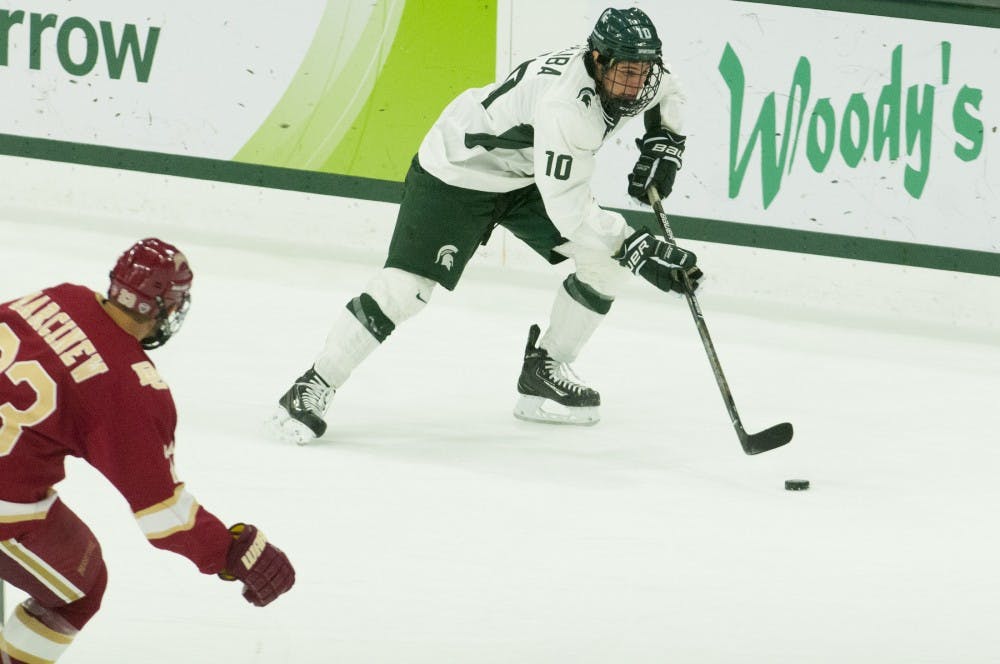 Freshman forward Sam Saliba (10) skates down the ice during the game against Denveron Oct. 21, 2016 at Munn Ice Arena.  The Spartans were defeated by the Pioneers, 2-1. 