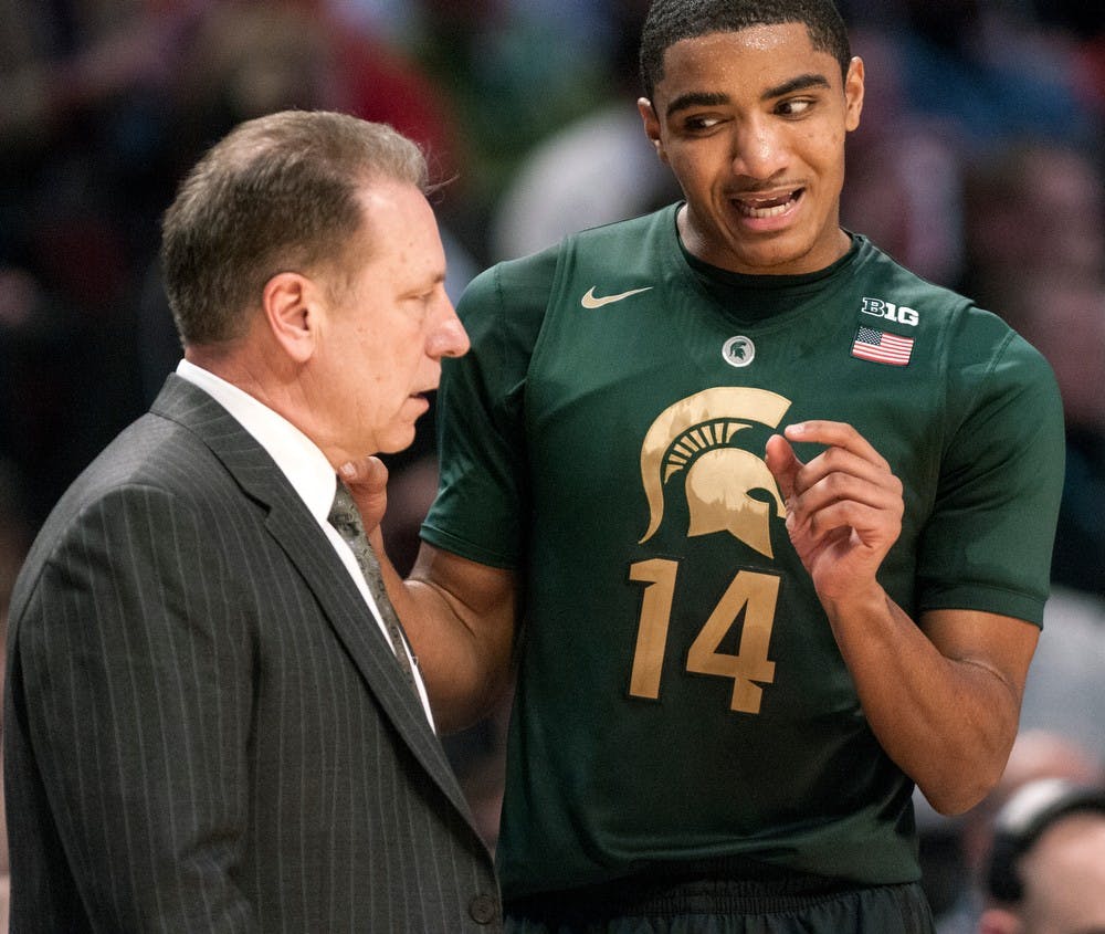 	<p>Men&#8217;s basketball head coach Tom Izzo talks with freshman guard Gary Harris during the semifinal round of the Big Ten Tournament against Ohio State on March 16, 2013, at United Center in Chicago, Ill. The Buckeyes beat the Spartans, 61-58. Natalie Kolb/The State News</p>