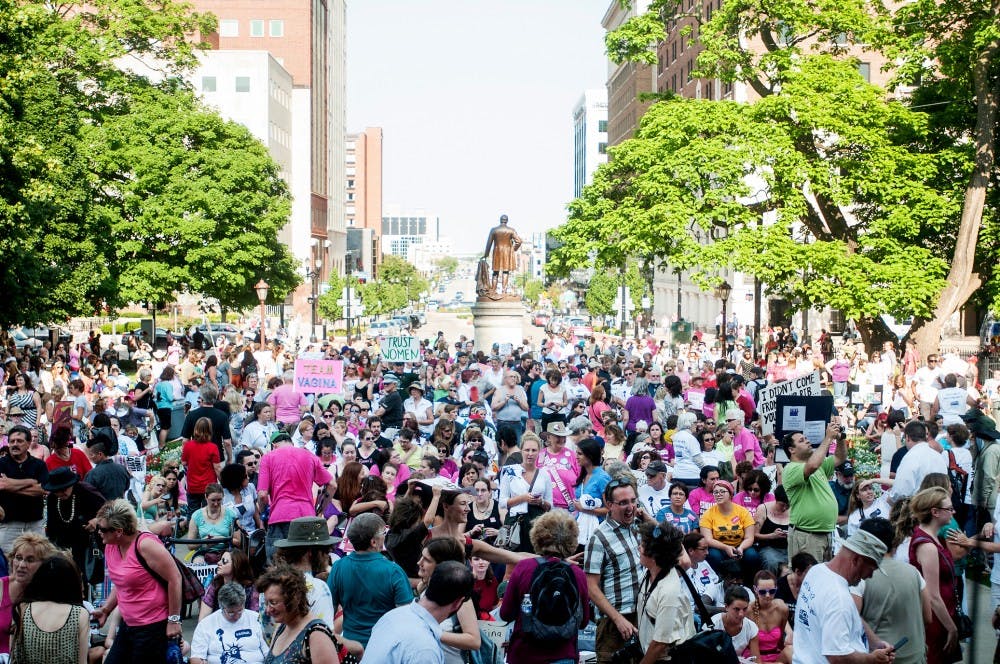 Thousands of supporters come to the Lansing State Capitol Building to watch a performance of "The Vagina Monologues" Monday, June 18, 2012.  State representative Lisa Brown was silenced after using the word “vagina” during a House of Representatives session last week. Adam Toolin/The State News