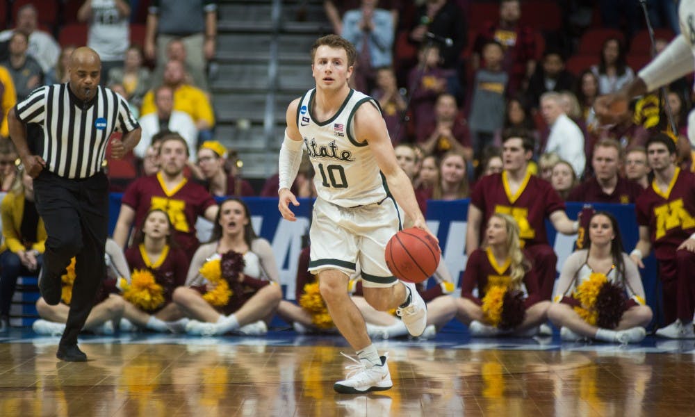 <p>Guard Jack Hoiberg (10) dribbles the ball during the second round game of the NCAA tournament against Minnesota on March 23, 2019 at Wells Fargo Arena. The Spartans defeated the Gophers, 70-50.</p>