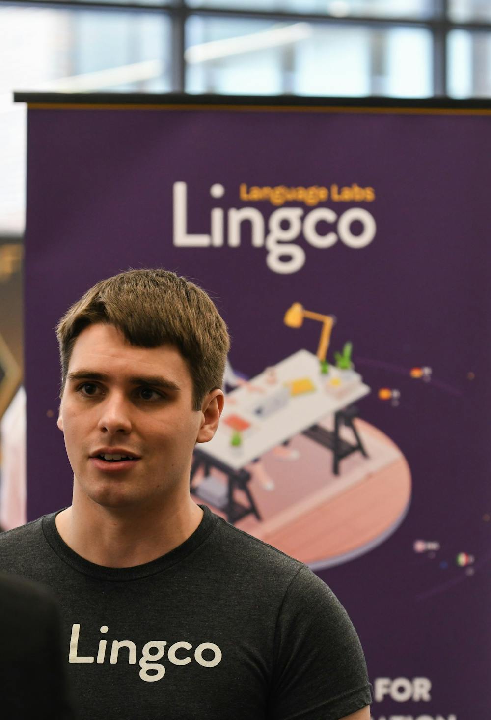Lingco Language Labs founder Seth Killian talks to potential employees during the career fair in the Minskoff Pavilion on MSU's campus on February 18, 2020. 