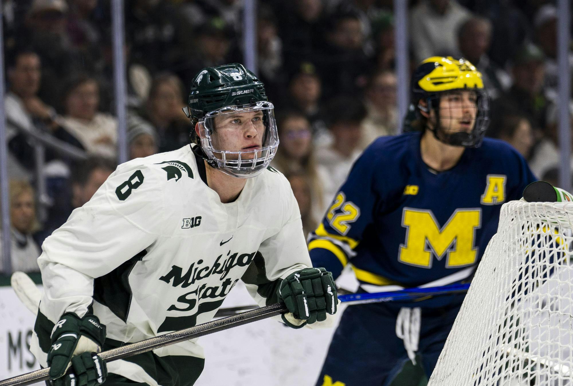 <p>Michigan State sophomore defender Maxim Štrbák (8) tracks the puck at Munn Ice Arena on Feb. 7, 2025.</p>