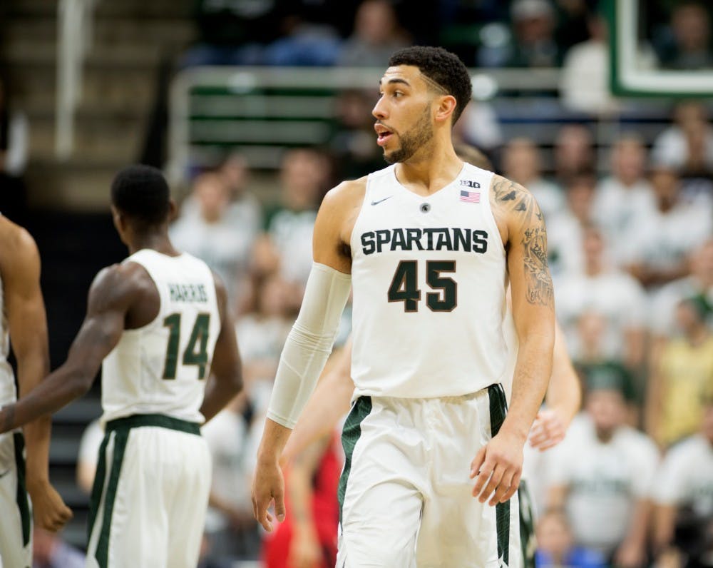 Senior forward Denzel Valentine walks down the court during the game against Rutgers on Jan. 31, 2016 at Breslin Center. The Spartans defeated the Scarlet Knights, 96-62. 