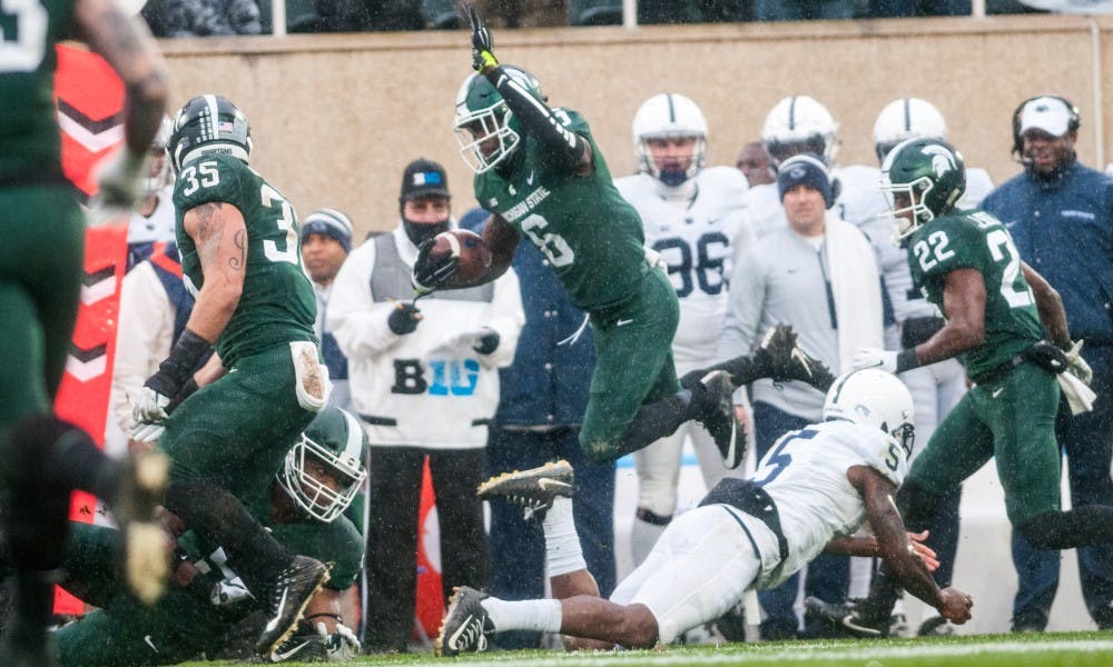 <p>Sophomore safety David Dowell is brought down while returning an interception during the game against Penn State, on Nov. 4, 2017, at Spartan Stadium. The Spartans defeated the Nittany Lions, 27-24.</p>