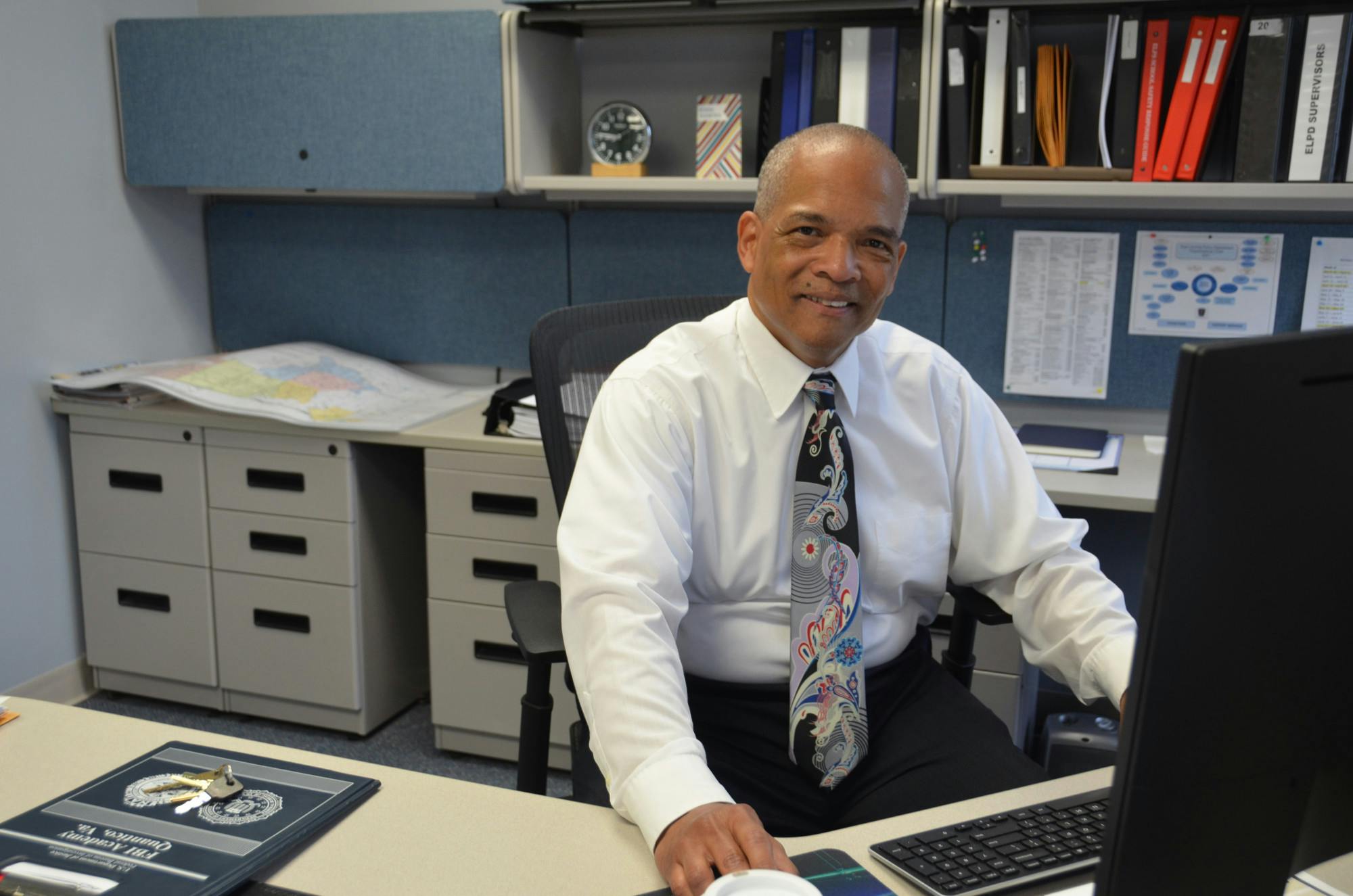 <p>Police Chief Kim Johnson in his office. Photo courtesy of East Lansing Police Department.</p>