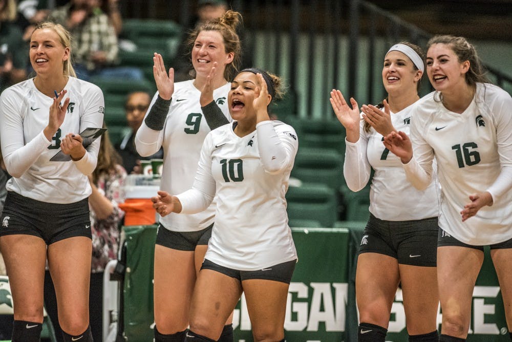 The Spartans react to a play during the game against Ohio State on Sept. 30, 2017 at Jenison Fieldhouse. The Spartans defeated the Buckeyes, 2-0. 