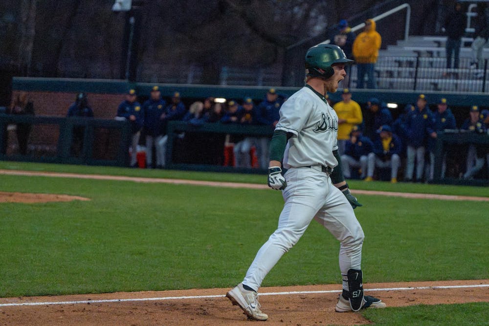 Michigan State designated hitter Noah Bright, 18, celebrates after successfully running the bases during Michigan State’s game against Michigan at Jeff Ishbia Field at McLane Stadium in East Lansing, Mich., on Friday, April 10, 2026.