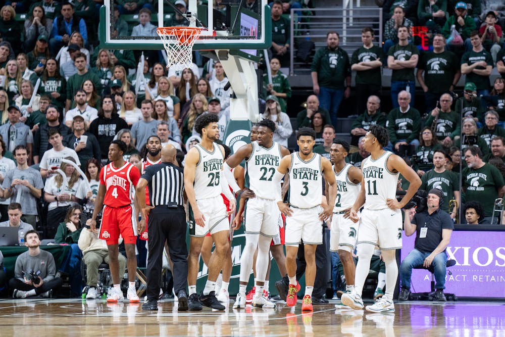 The Spartans discussing strategy during a game against Ohio State University at the Breslin Student Event Center on Feb. 25, 2024.