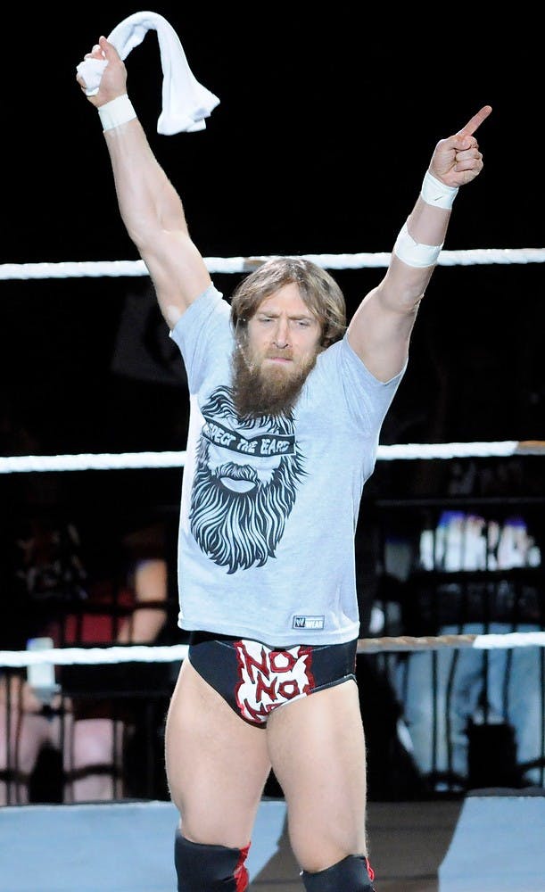 	<p>Daniel Bryan pumps up the crowd before his match Sept. 13, 2013 at the Breslin Center. Khoa Nguyen/The State News</p>