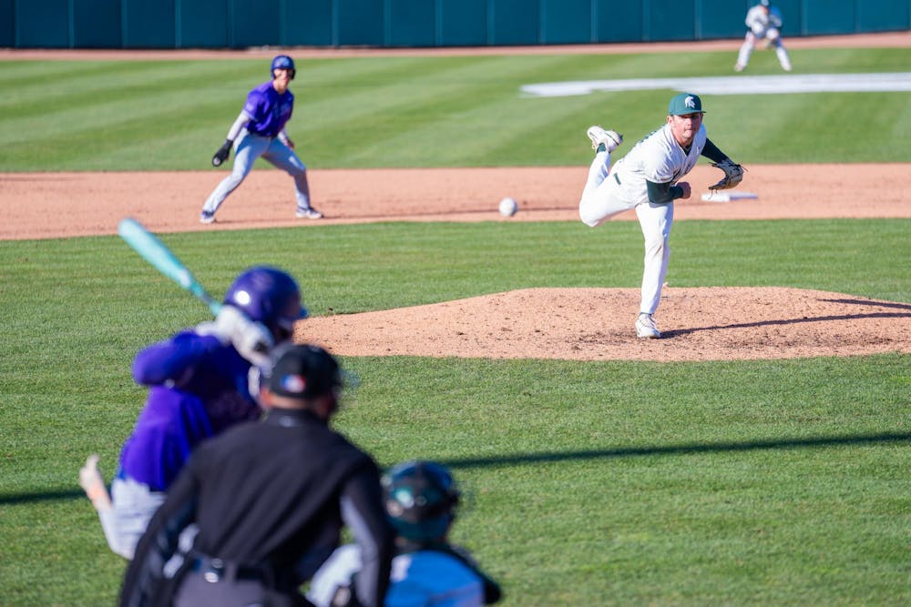 <p>Right-handed pitcher Noah Matheny (29) hurls a pitch toward home plate during Michigan State baseball's home-opener at McLane Baseball Stadium on March 15, 2024. The Spartans came out on top against the University of Evansville Purple Aces with their first victory of the regular season, putting up a final score of 11-3.</p>