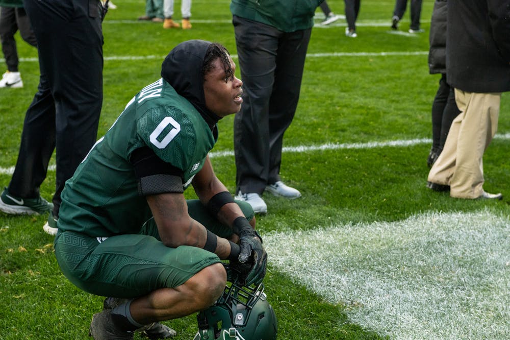<p>Among the commotion, Brantley watches the celebrations unfold in Spartan Stadium after the team&#x27;s triumph over Michigan, the win of the Paul Bunyan trophy and the continuation of their undefeated season. Oct 30, 2021. </p>