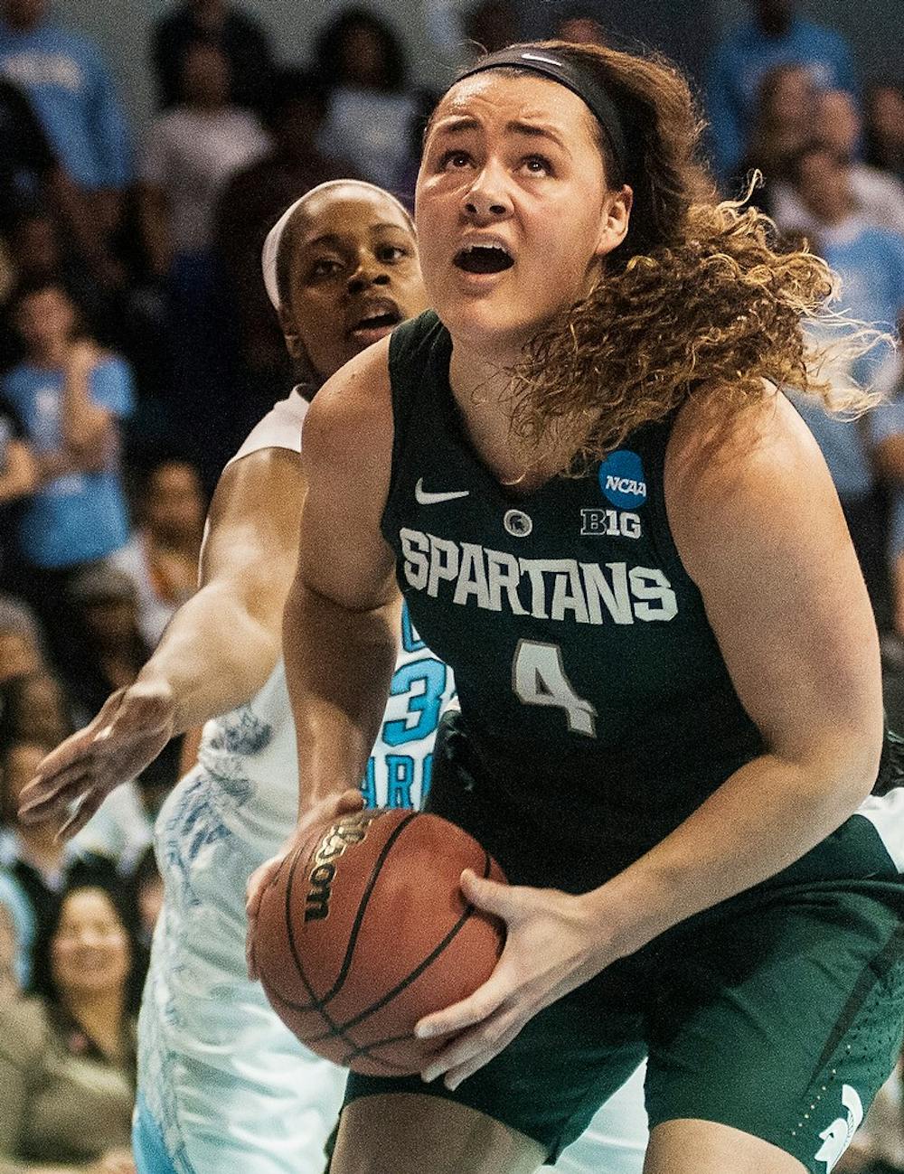 <p>Junior center Jasmine Hines looks to shoot March 25, 2014, during a game against North Carolina at Carmichael Arena in Chapel Hill, N.C. The Spartans lost, 62-53. Erin Hampton/The State News</p>