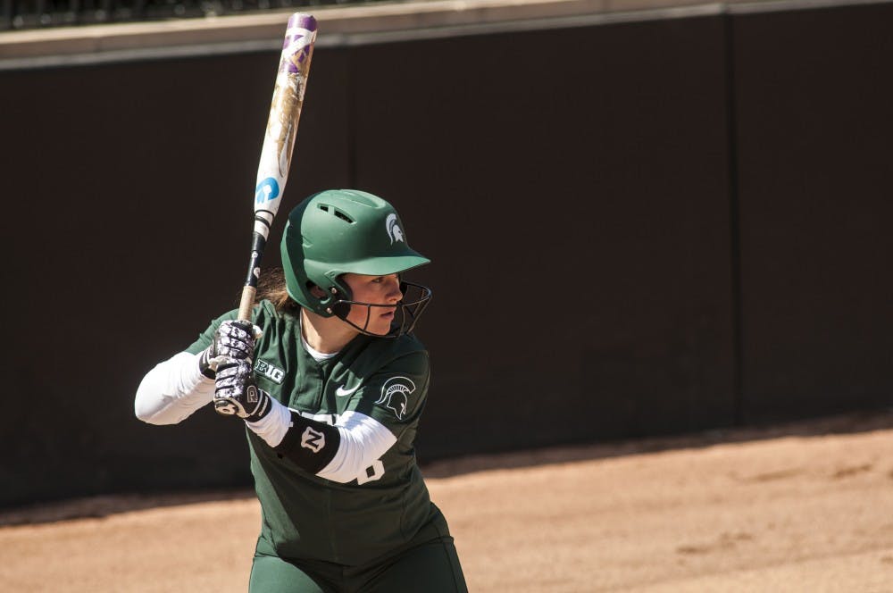 Junior third-baseman Kaitlyn Eveland (8) goes up to bat during the game against Minnesota on April 8, 2018 at Secchia Stadium. The Vikings defeated the Spartans, 6-2. (Annie Barker | State News)