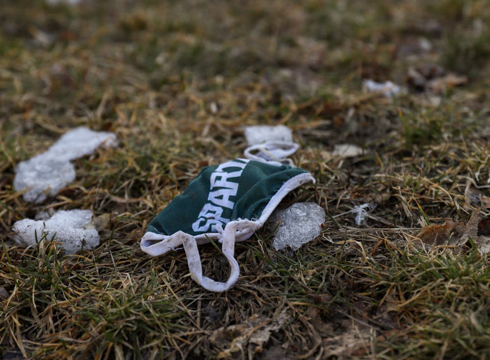 Mar. 7- East Lansing- A mask on the ground that says the word "Spartans" on it. 