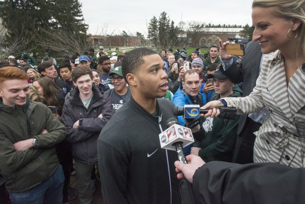 <p>Freshman forward Miles Bridges (22) speaks to the media after Bridges's announcement that he will be continuing his MSU basketball career in the 2017-2018 season on April 13, 2017 at The Spartan statue. Hundreds of students gathered around the statue in support of Miles Bridges's return to MSU.</p>