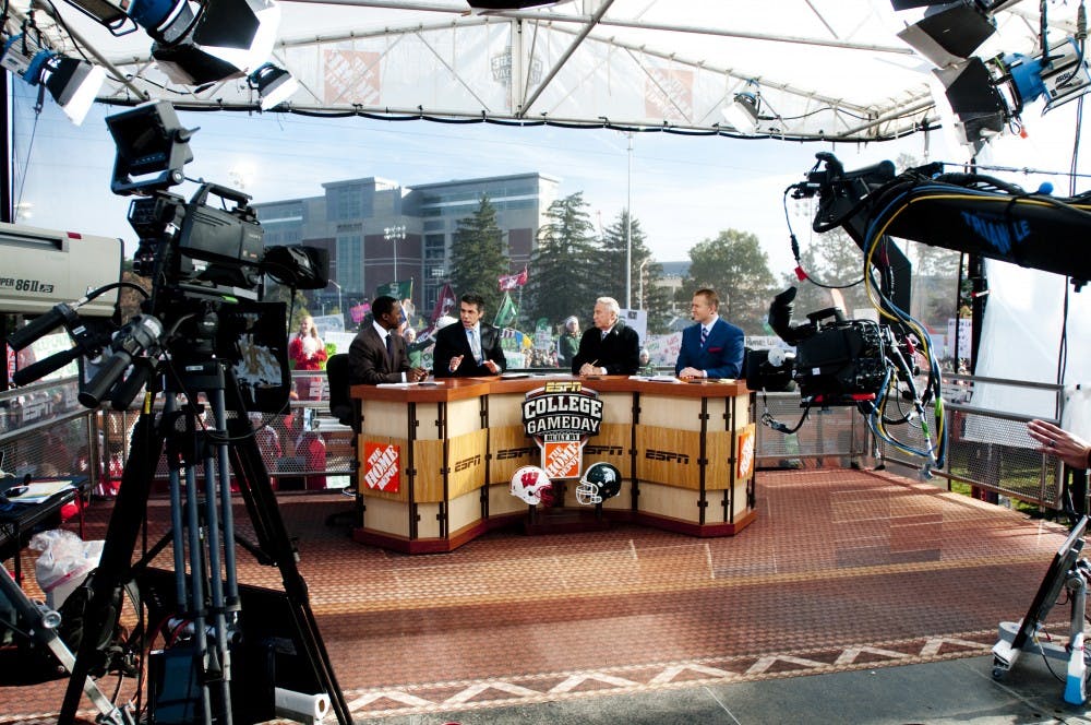 From left, Desmond Howard, Chris Fowler, Lee Corso and Kirk Herbstreit during ESPN's "College GameDay" on Saturday morning at Munn Field. The last time the show was hosted at MSU was 2005. Josh Radtke/The State News