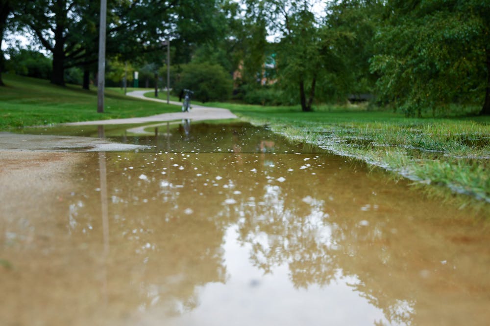 <p>The river walk along the Red Cedar River on MSU&#x27;s campus flooded with rainwater after severe thunderstorms on September 13th, 2021.</p>