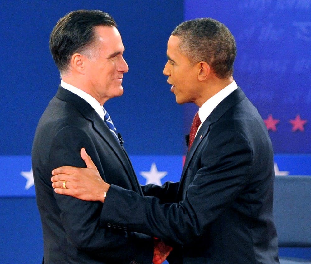 	<p>President Barack Obama, right, shakes hands with <span class="caps">GOP</span> presidential nominee Mitt Romney Tuesday. (Wanglei/Xinhua/Zuma Press/MCT)</p>