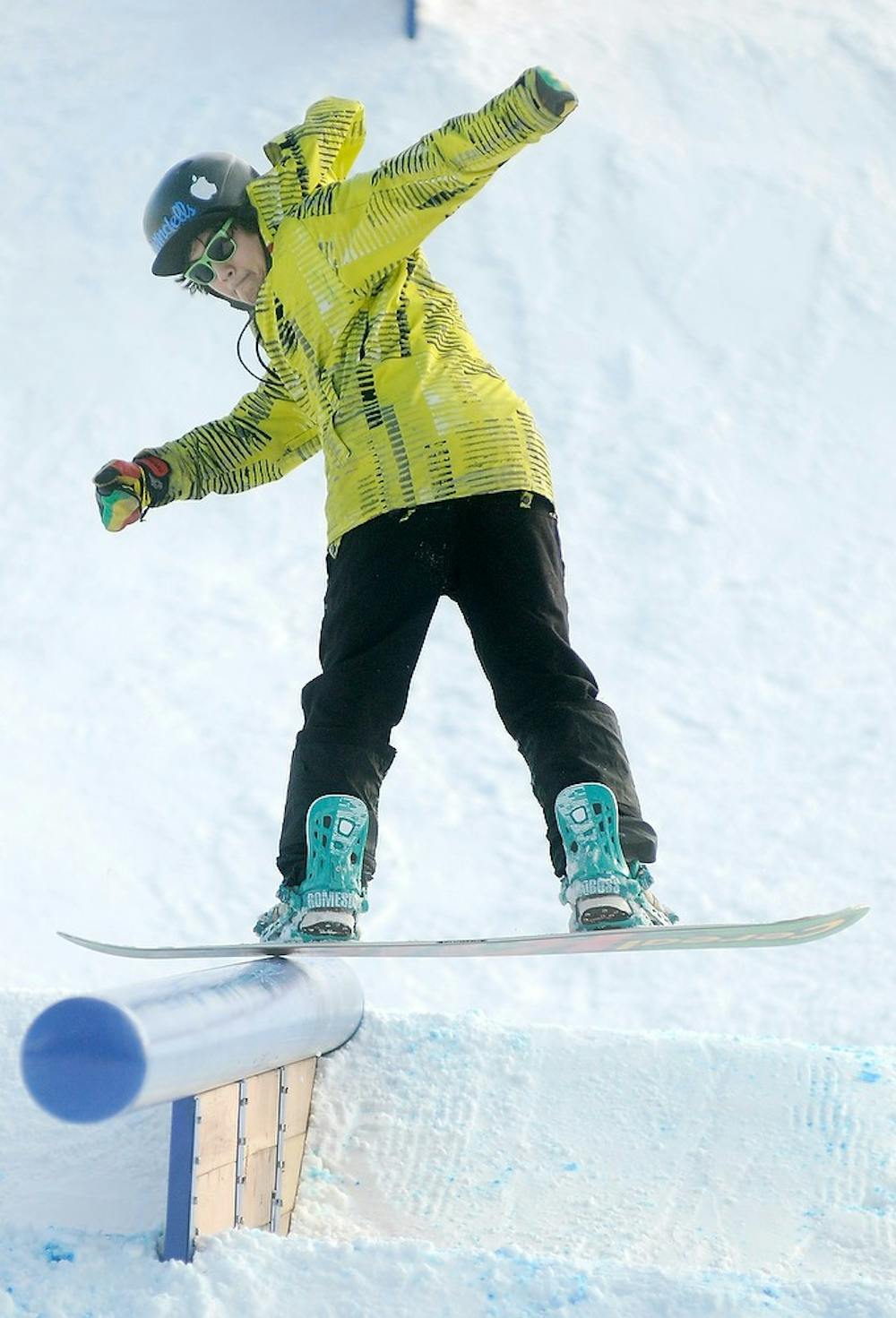 	<p>Northwood University student Mike Tonz does a front board slide down the mountain Jan. 5, 2013, at Hawk Island Snow Park 1601 E. Cavanaugh Rd., in Lansing. Tonz said he was there with Middle Earth Snowboard Series, which hosts snowboard events throughout Michigan. Natalie Kolb/The State News</p>