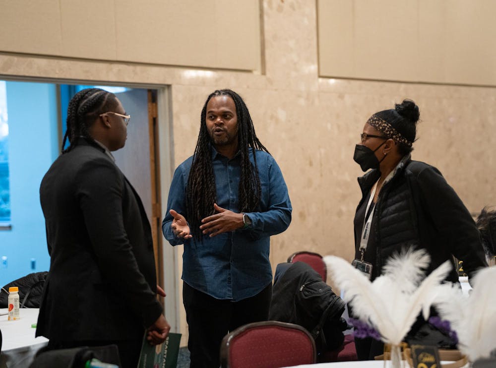 Family members talking before the Fall 2023 Black Grad event at the Union Ballroom on Dec. 8, 2023. 