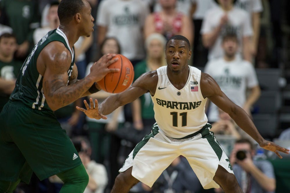 Sophomore guard Lourawls Nairn Jr. defends against Eastern Michigan guard Willie Mangum IV as he looks to pass the ball during the first half of the game against Eastern Michigan on Nov. 23, 2015 at Breslin Center. The Spartans defeated the Eagles, 89-65.