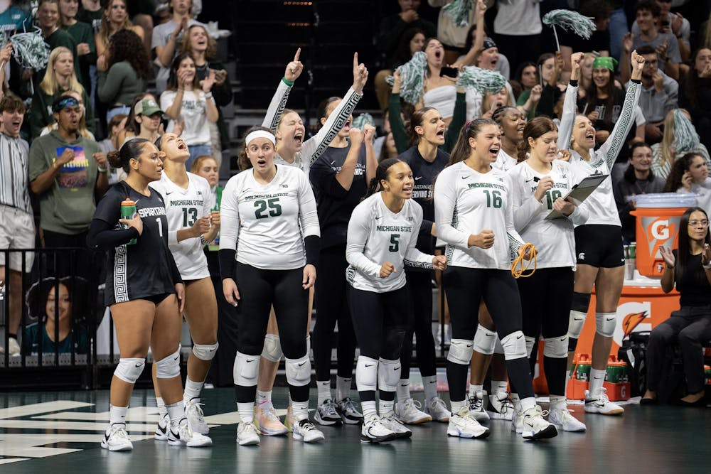 <p>MSU Volleyball players celebrate on the sideline during Michigan States' game against Duke on September 8, 2023 at the Jack Breslin Student Events Center. The Michigan State Spartans lost in three sets.</p>