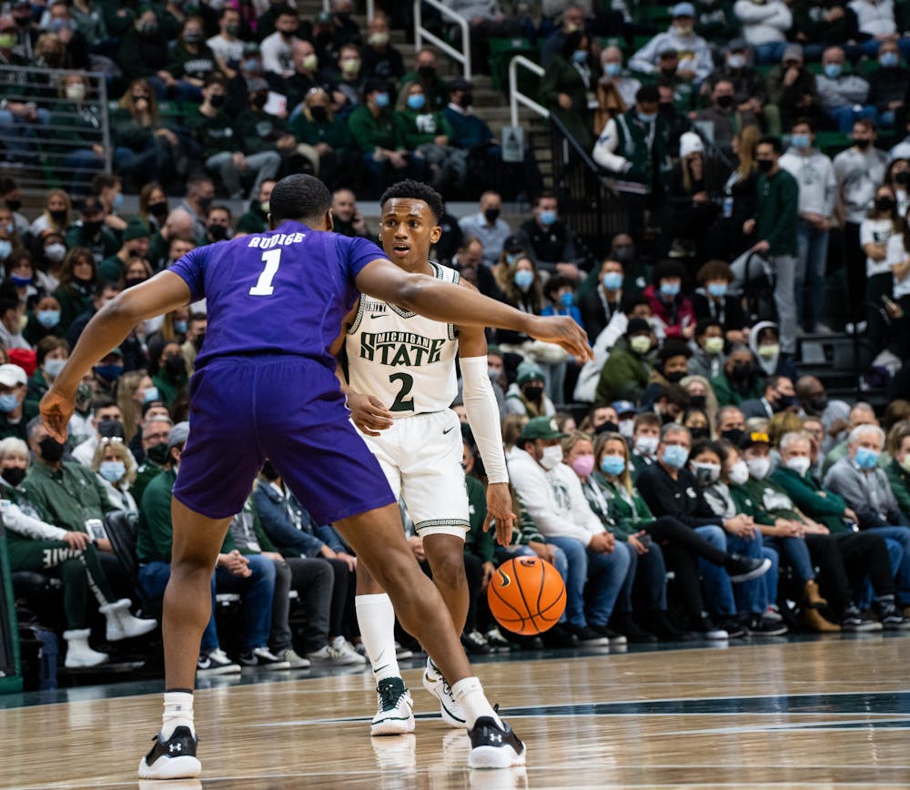 <p>Northwestern&#x27;s redshirt junior guard Chase Audige (1) guards Michigan State&#x27;s junior guard Tyson Walker (2) during Michigan State&#x27;s loss on Jan. 15, 2022.</p>
