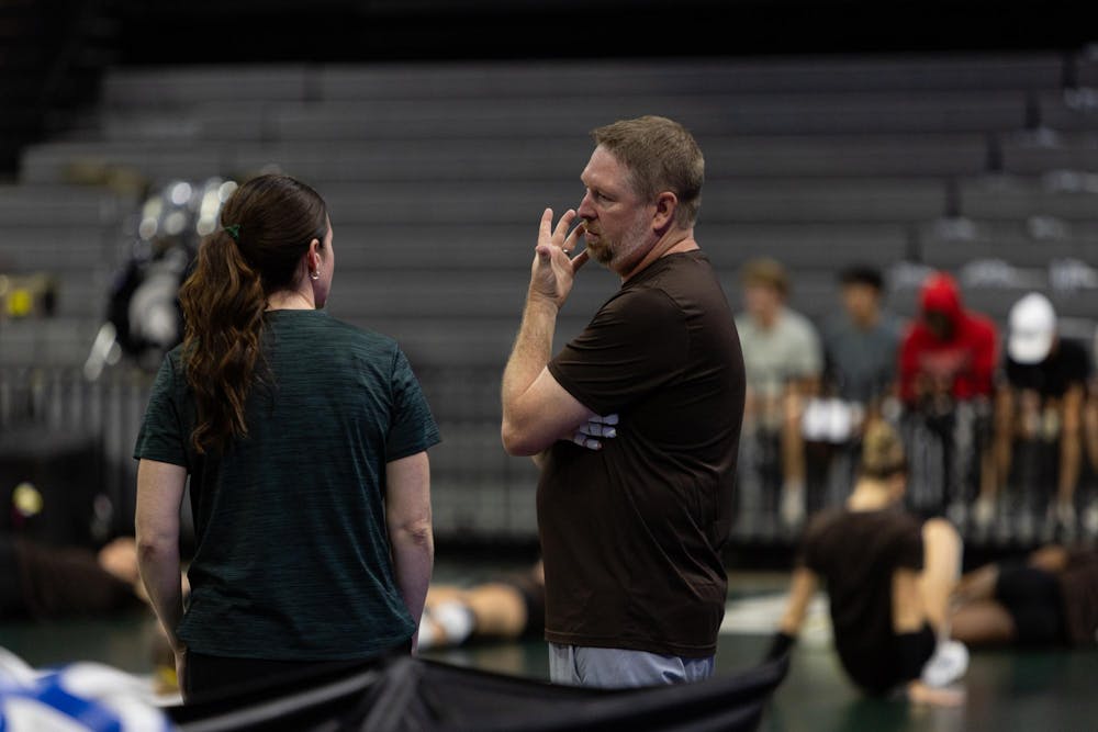 <p>Michigan State head coach Kristen Kelsay chats with Western Michigan senior associate head coach Ryan Manning prior to the Michigan State vs Western Michigan volleyball game at the Breslin Center on Tuesday, Sept. 8, 2026.</p>