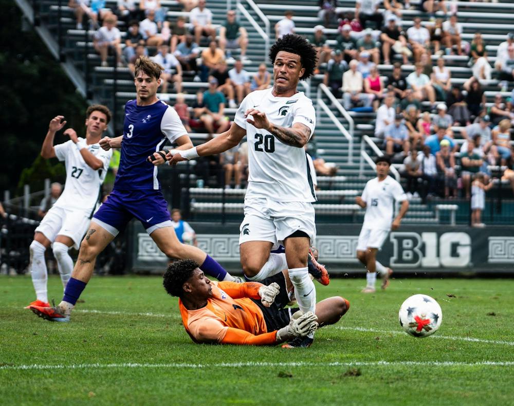 <p>MSU sophomore forward, Kayden Hudson (20) runs over Niagara senior goalkeeper, Grant Wyles (1) at DeMartin Stadium in East Lansing, Mich., on Sunday, Aug 30, 2026.</p>