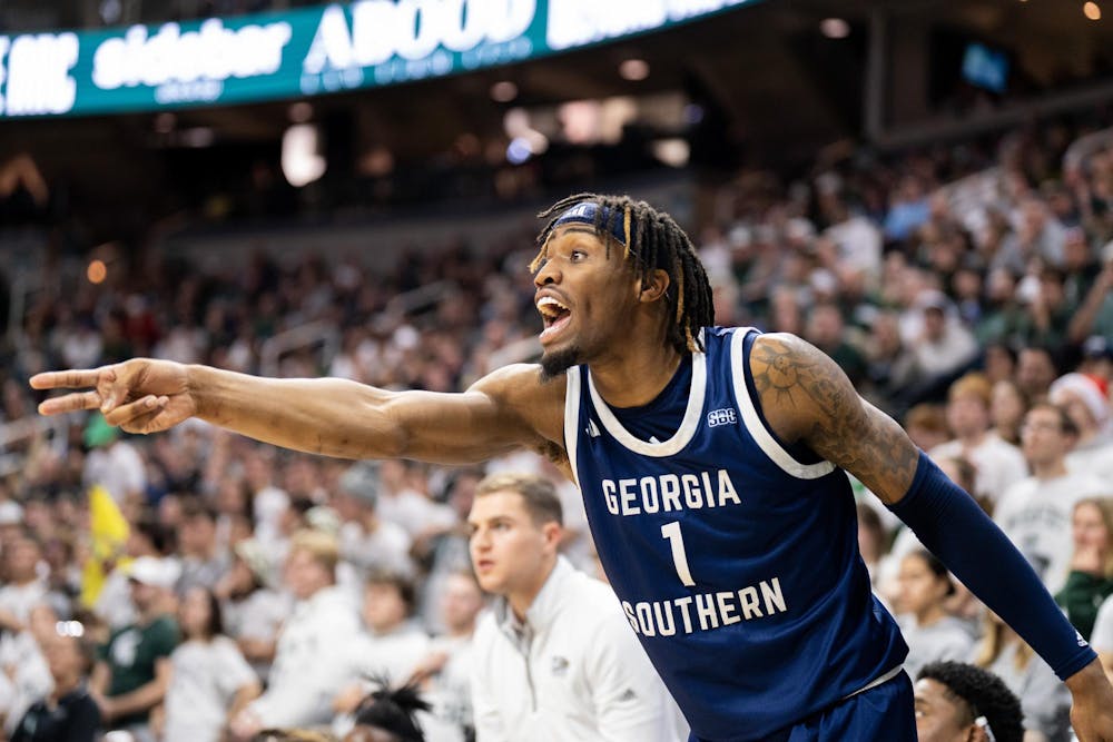 <p>Georgia Southern Freshman Forward Collin Kuhl (1) yells and signals to teammates during their game against Michigan State at the Jack Breslin Student Events Center on Nov. 28, 2023. Kuhl's Eagles would go on to lose 86-55 to the Spartans.</p>