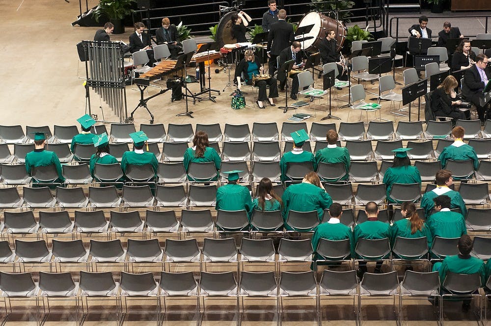 <p>Students take their seats prior to the Spring Convocation ceremony May 2, 2014, at Breslin Center. Graduating seniors were honored as a whole prior to individual college commencement ceremonies. Danyelle Morrow/The State News</p>