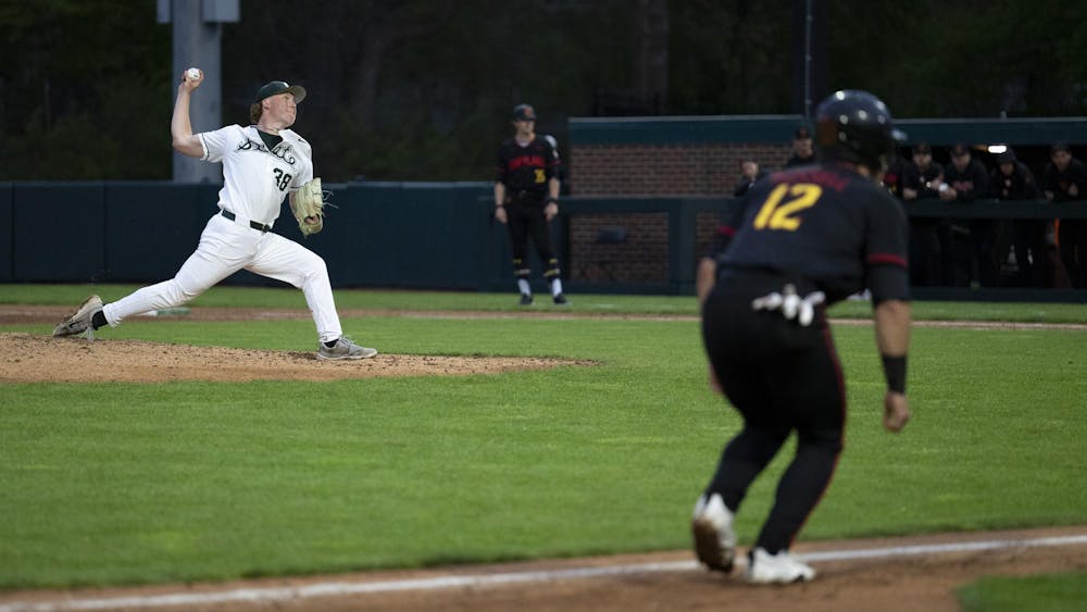 <p>Maryland freshman Kyle Rudolph pitches the ball as Devin Russell watches from base at Jeff Ishbia Field at McLane Baseball Stadium in East Lansing, Mich., on Friday, April 24, 2026. </p>
