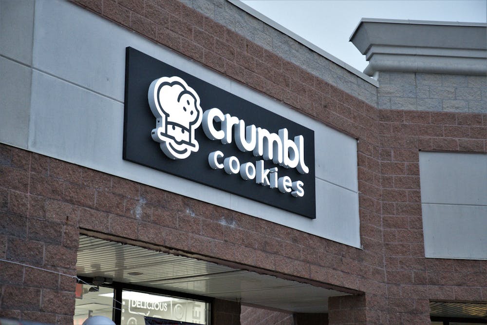 <p>The new Crumbl Cookies storefront in Lansing ﻿brought customers of all ages to grab a box of their famous cookies on Dec. 2, 2022. The new storefront opened on Dec. 2, 2022. </p>