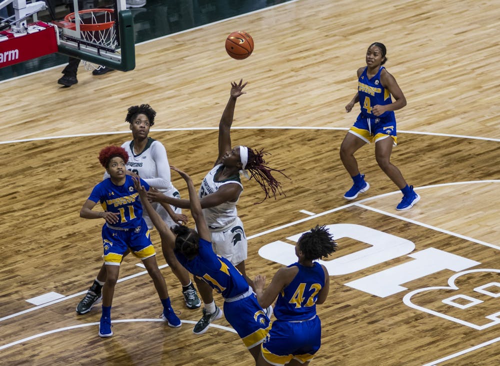 <p>Junior forward Jayla James shoots the ball in the Spartan’s match against the Morehead State Eagles at the Breslin Center on Tuesday, Nov. 9, 2021. </p>